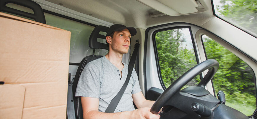 Commercial truck driver driving