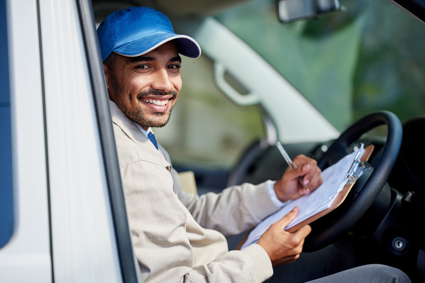 Delivery person checking schedule