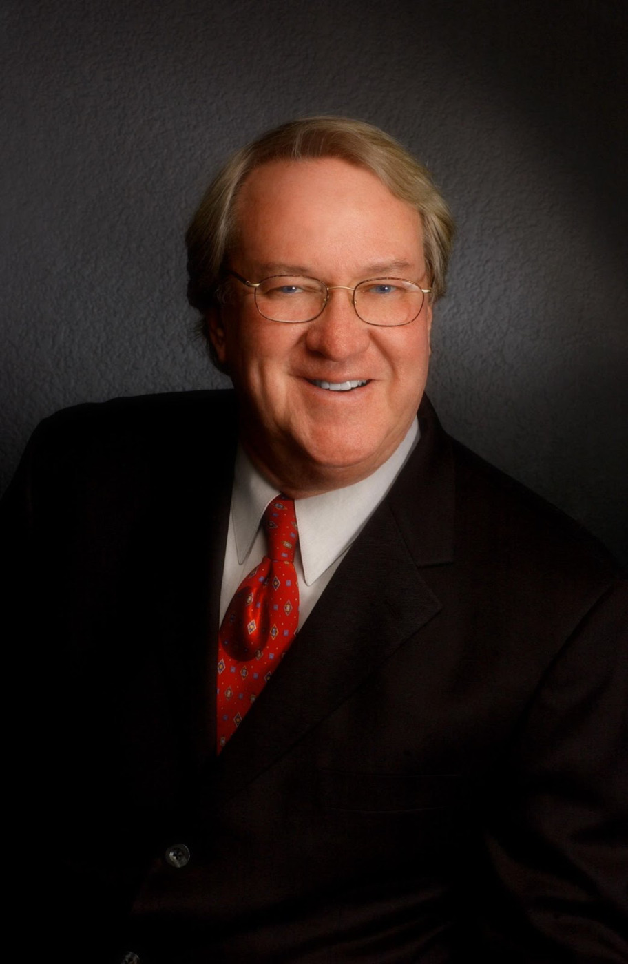 Headshot of John Lee, founder and CEO of Impact Marketing Services