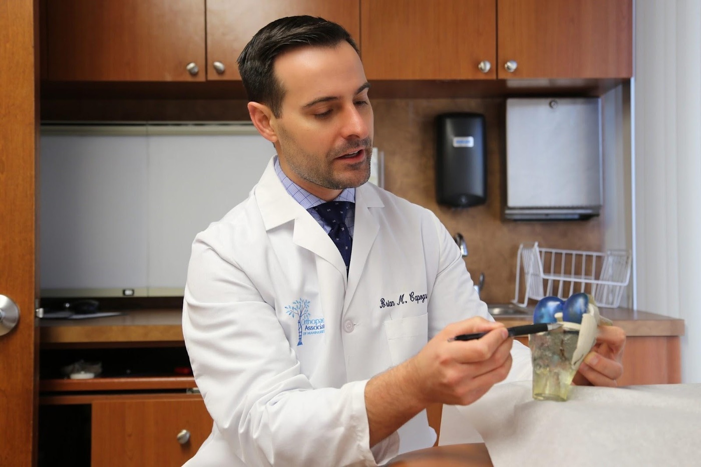 Brian Capogna, MD specializes in shoulder, elbow, hip, and knee injuries.