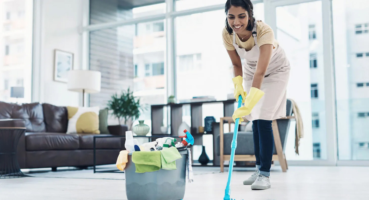 Woman mopping floor