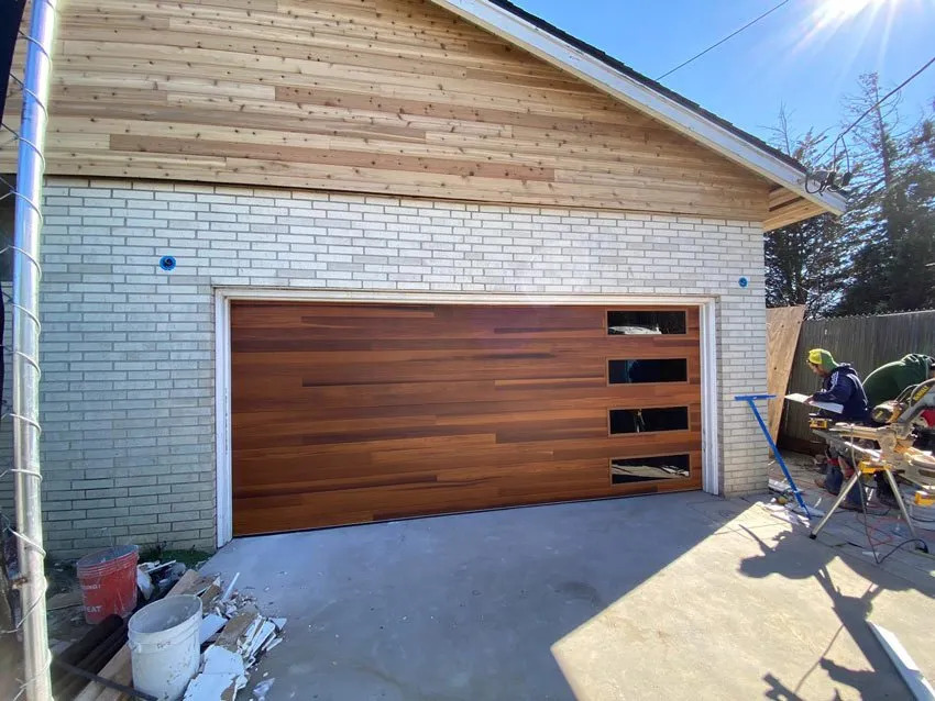 Melikson Garage Door offers expert installation, repair, and maintenance services for garage doors, serving both residential and commercial clients.