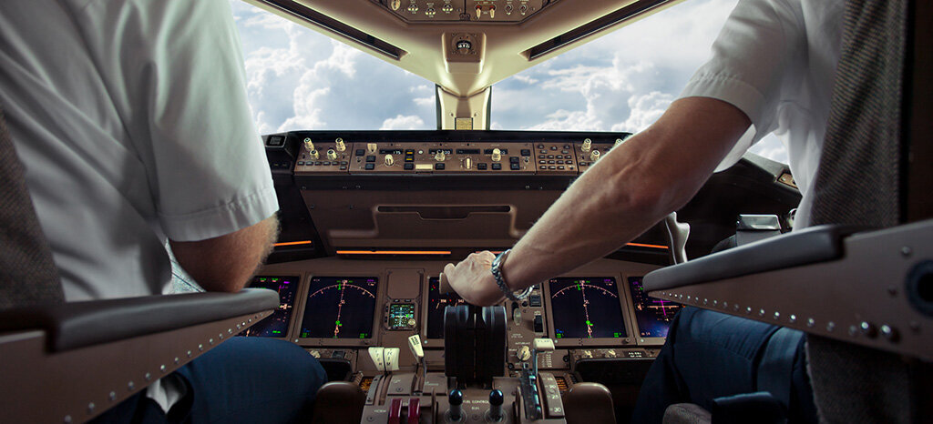 pilots in aircraft cockpit