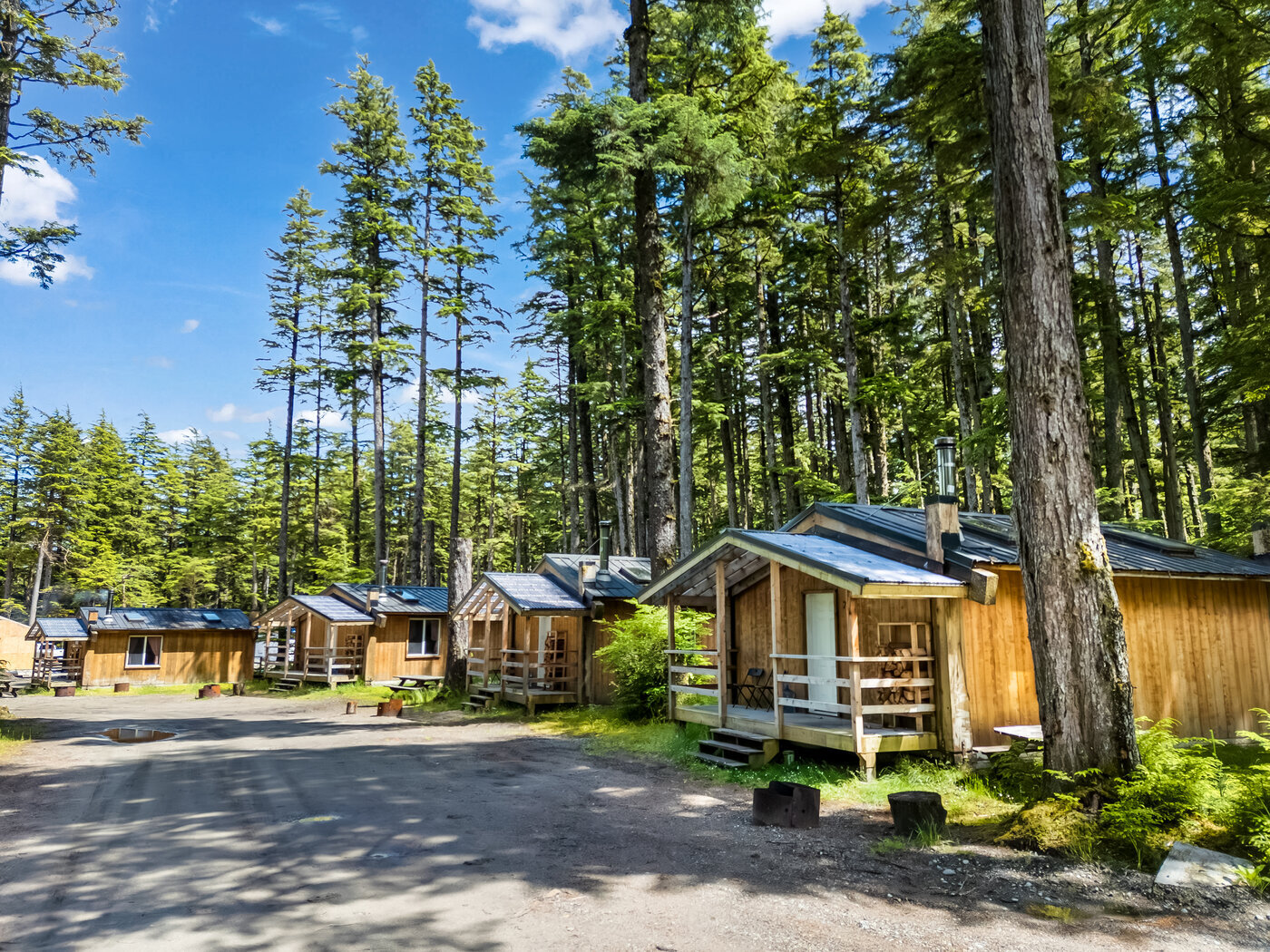 Hiellen Village Longhouses provides nature-immersive accommodations on Haida Gwaii, offering travelers access to Haida Gwaii cabin rentals, group cabins, and RV camping while respecting the land and local cultural traditions.