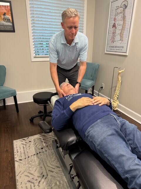 Leigh Brain & Spine is a Chapel Hill-based chiropractic and spine clinic led by Dr. Cosmas Leigh, offering advanced non-surgical spinal decompression and personalized treatment solutions.