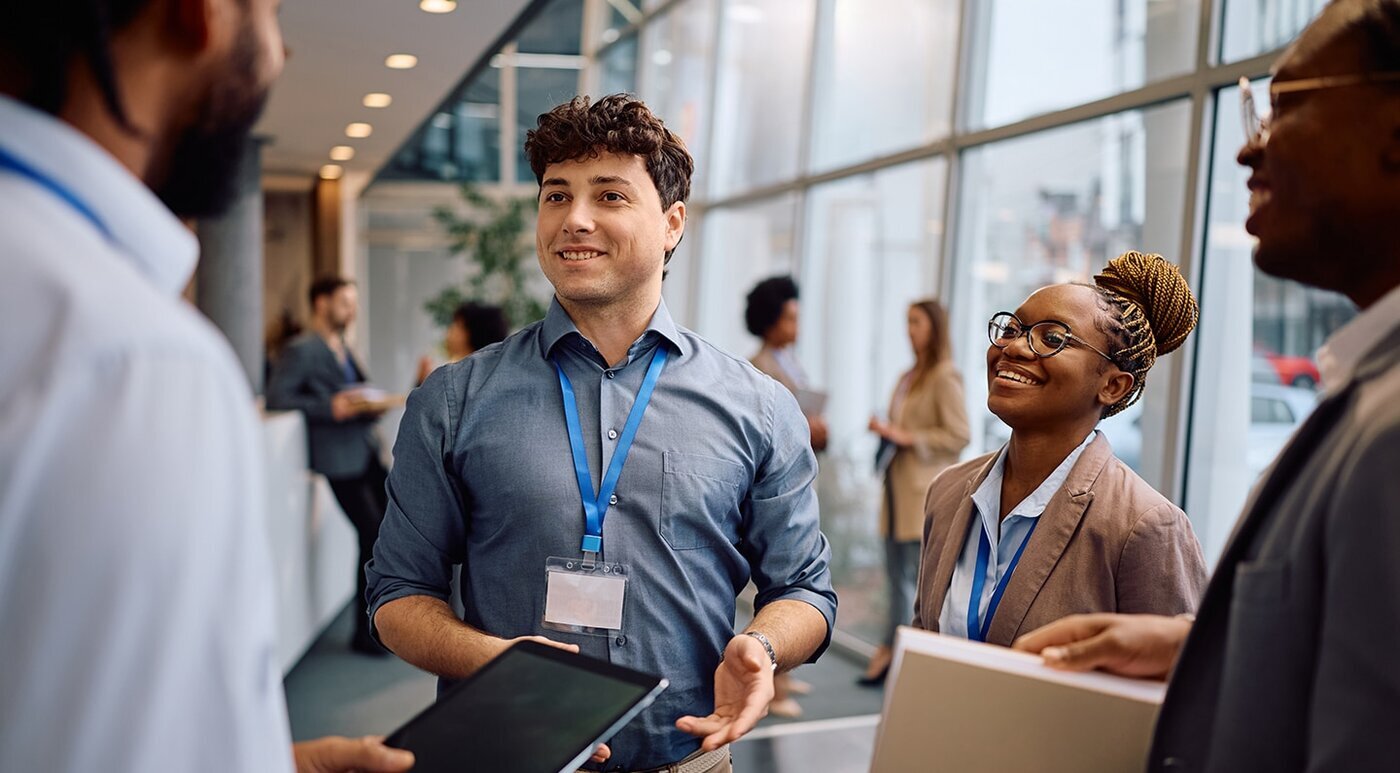 Talking to colleagues at a conference
