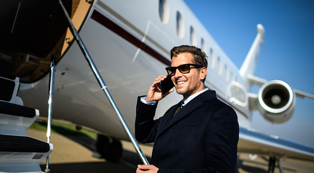 Business man getting on private jet