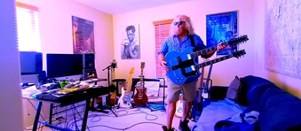 Writer Director Professor Musician Engineer & Producer James Lay in his home studio 