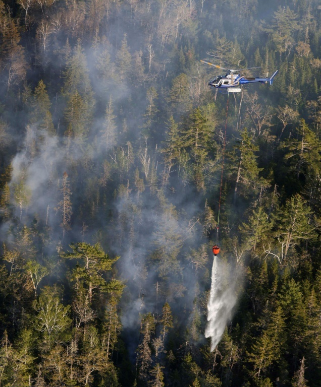 Heat wave and wildfires scorch east Canada